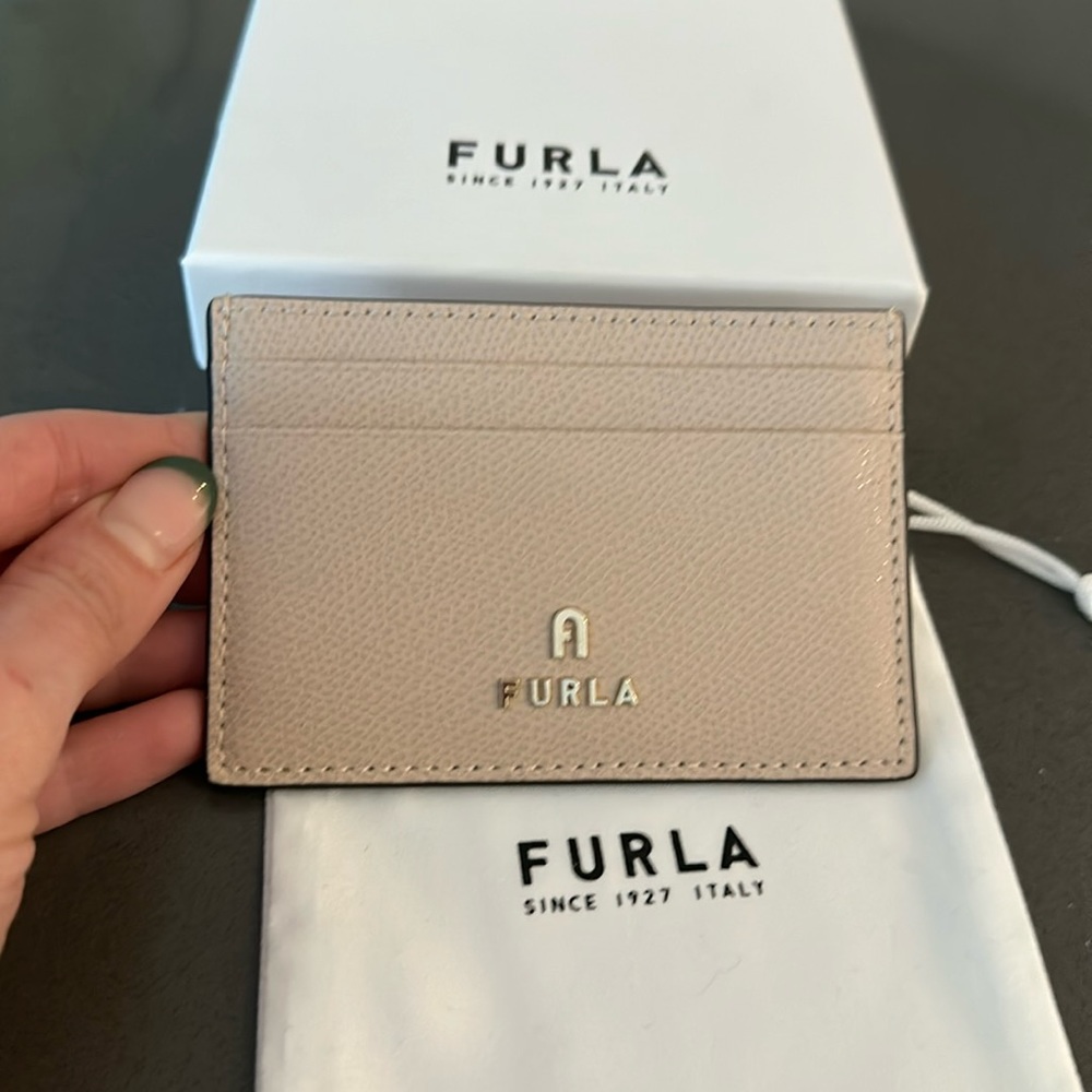Brand new Furla card holder in cream